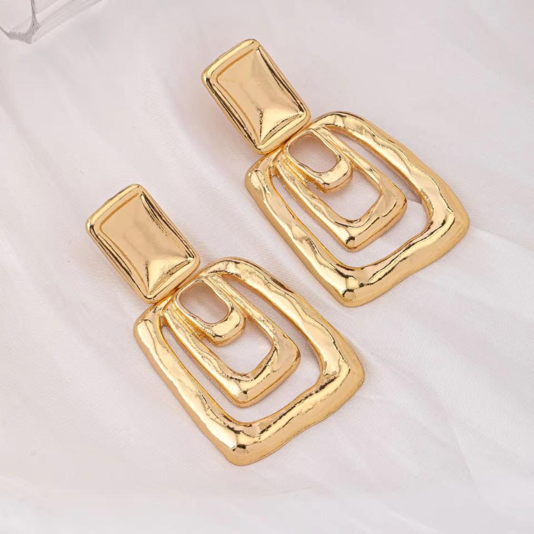 Bold Geometric Gold Dangle Earrings