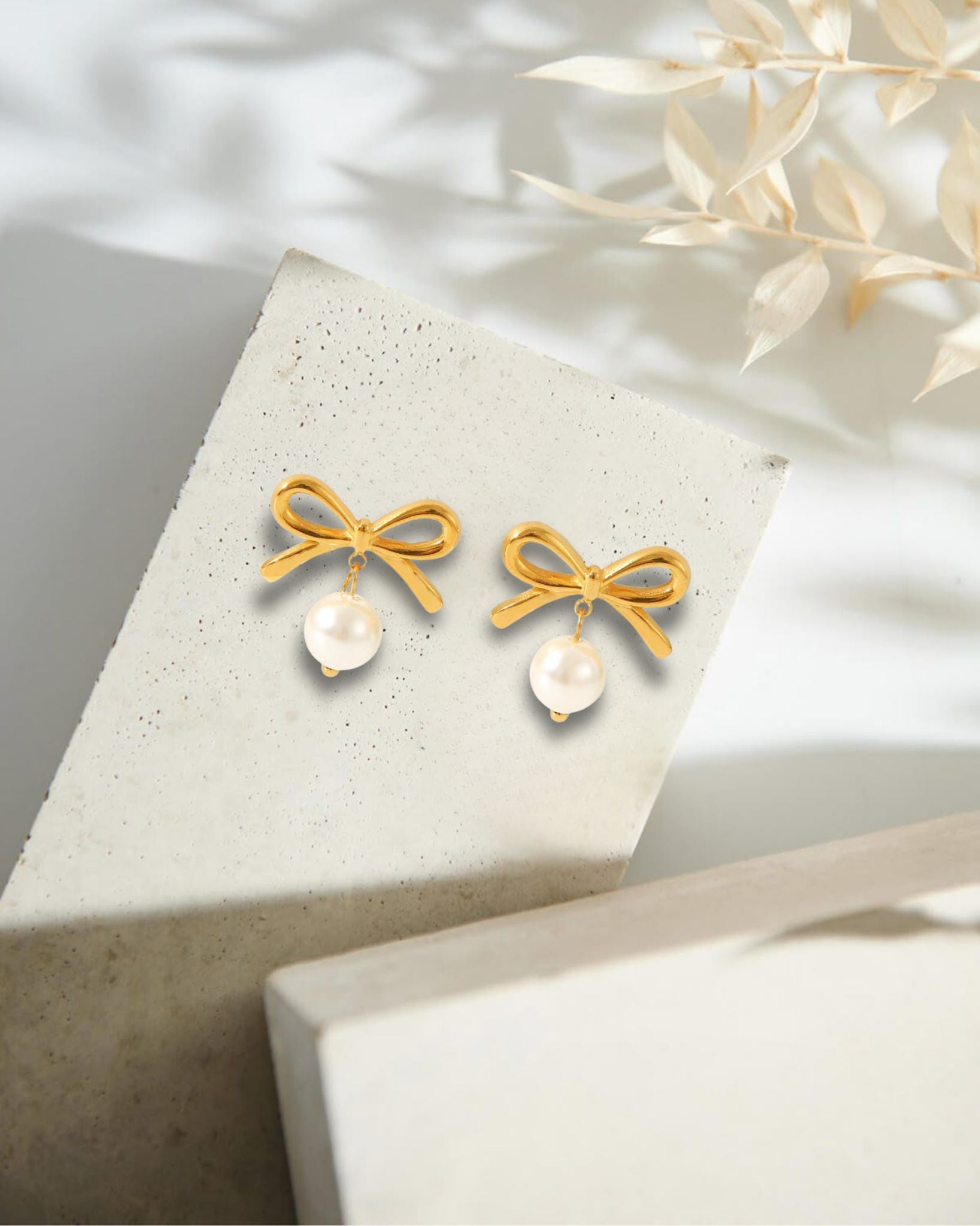 Golden Grandeur Bow & Pearl Drop Earrings
