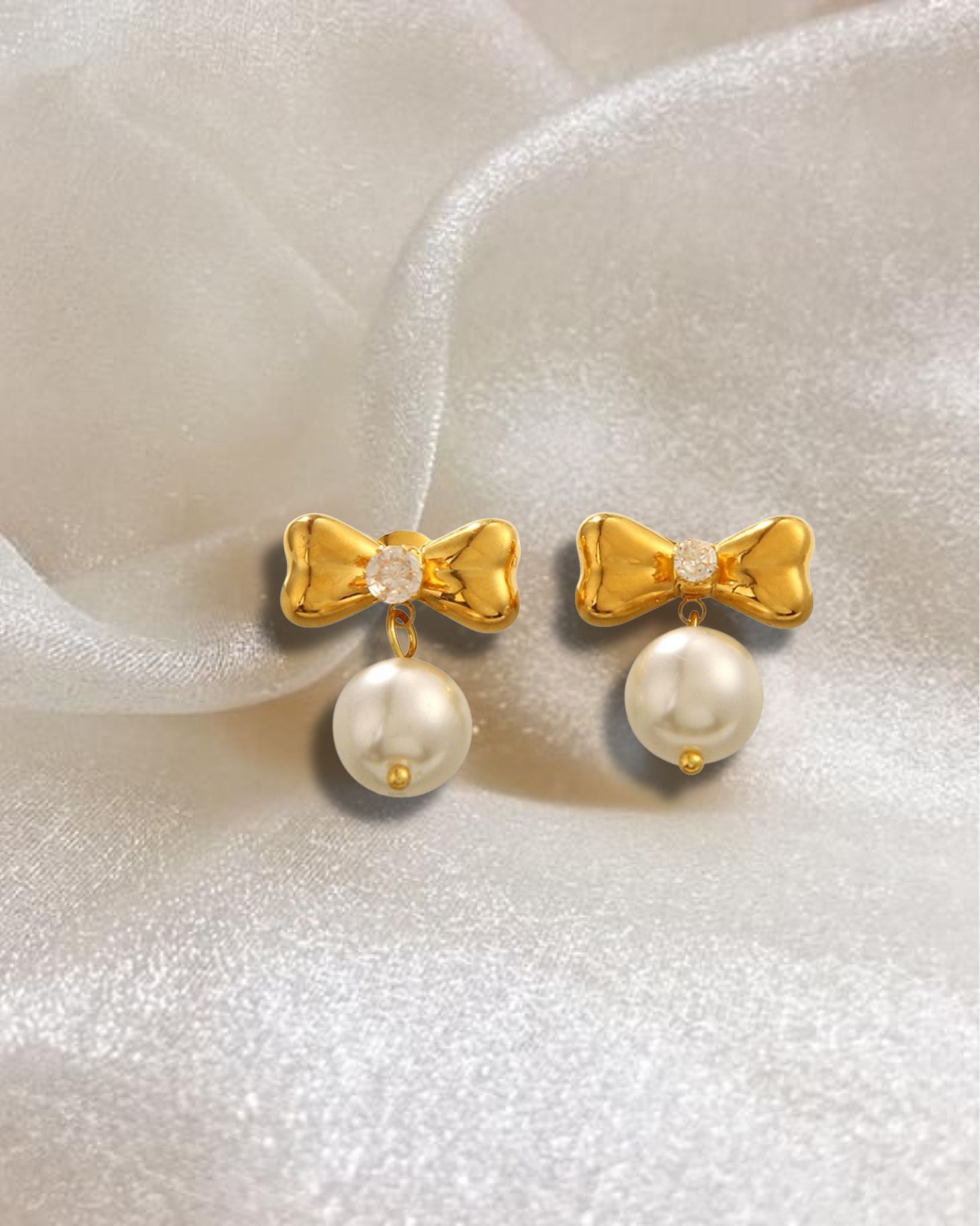 Golden Grandeur Bow & Pearl Drop Earrings